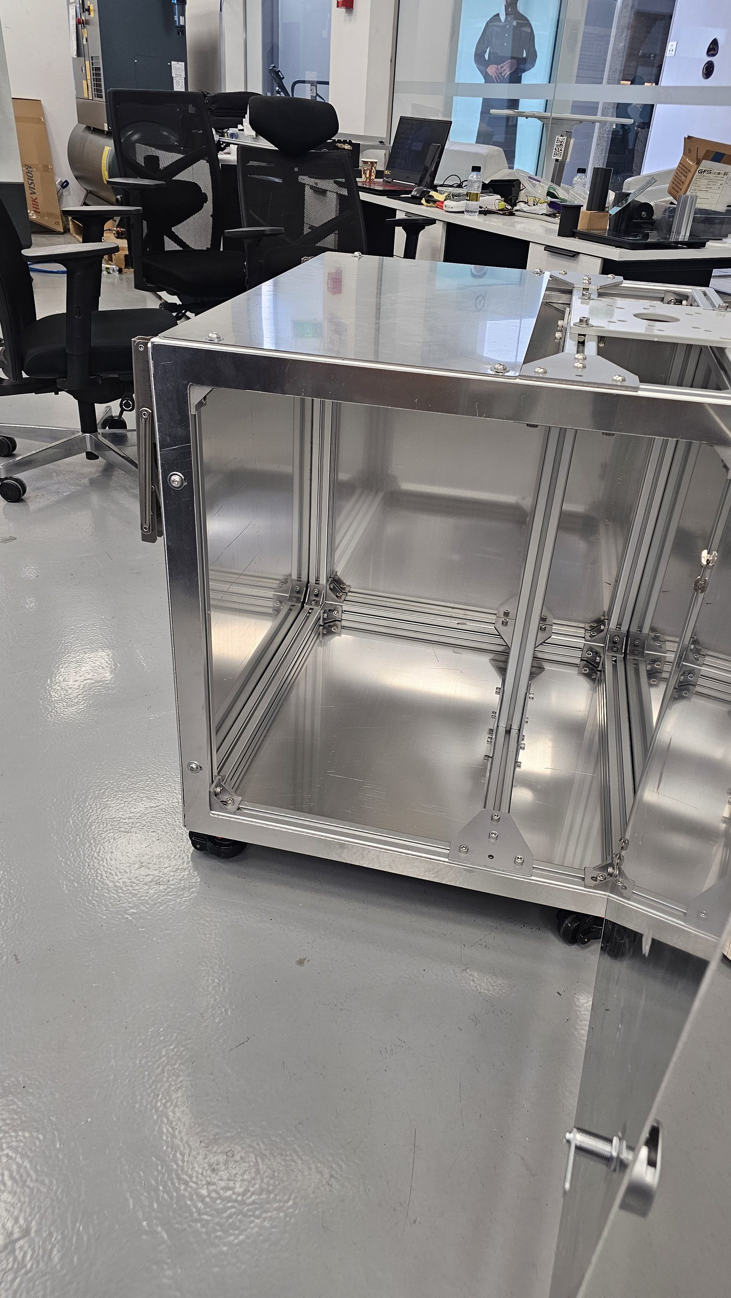 Robot cell with enclosure panels during integration
