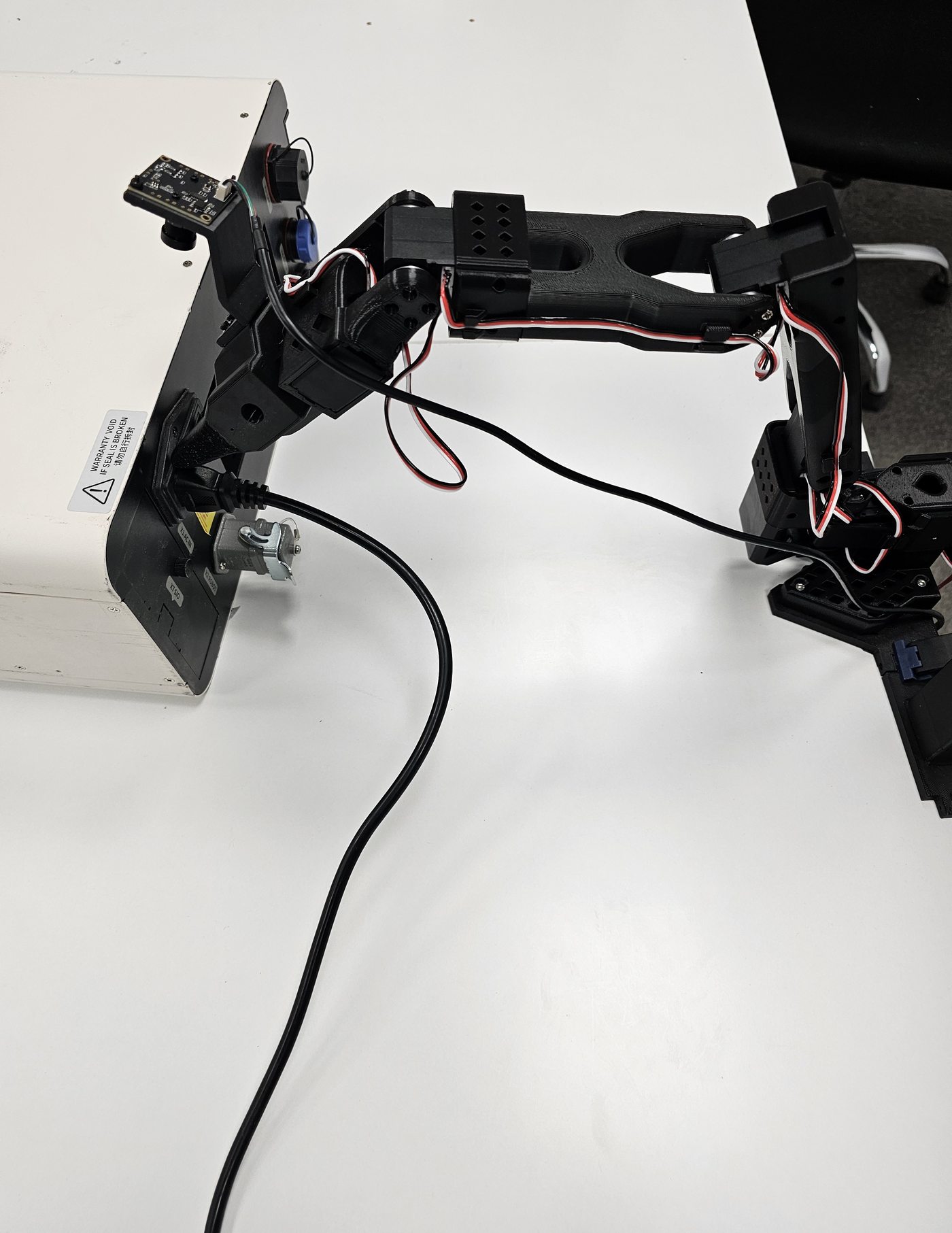 SO-101 robot arm hardware and onboard vision detail